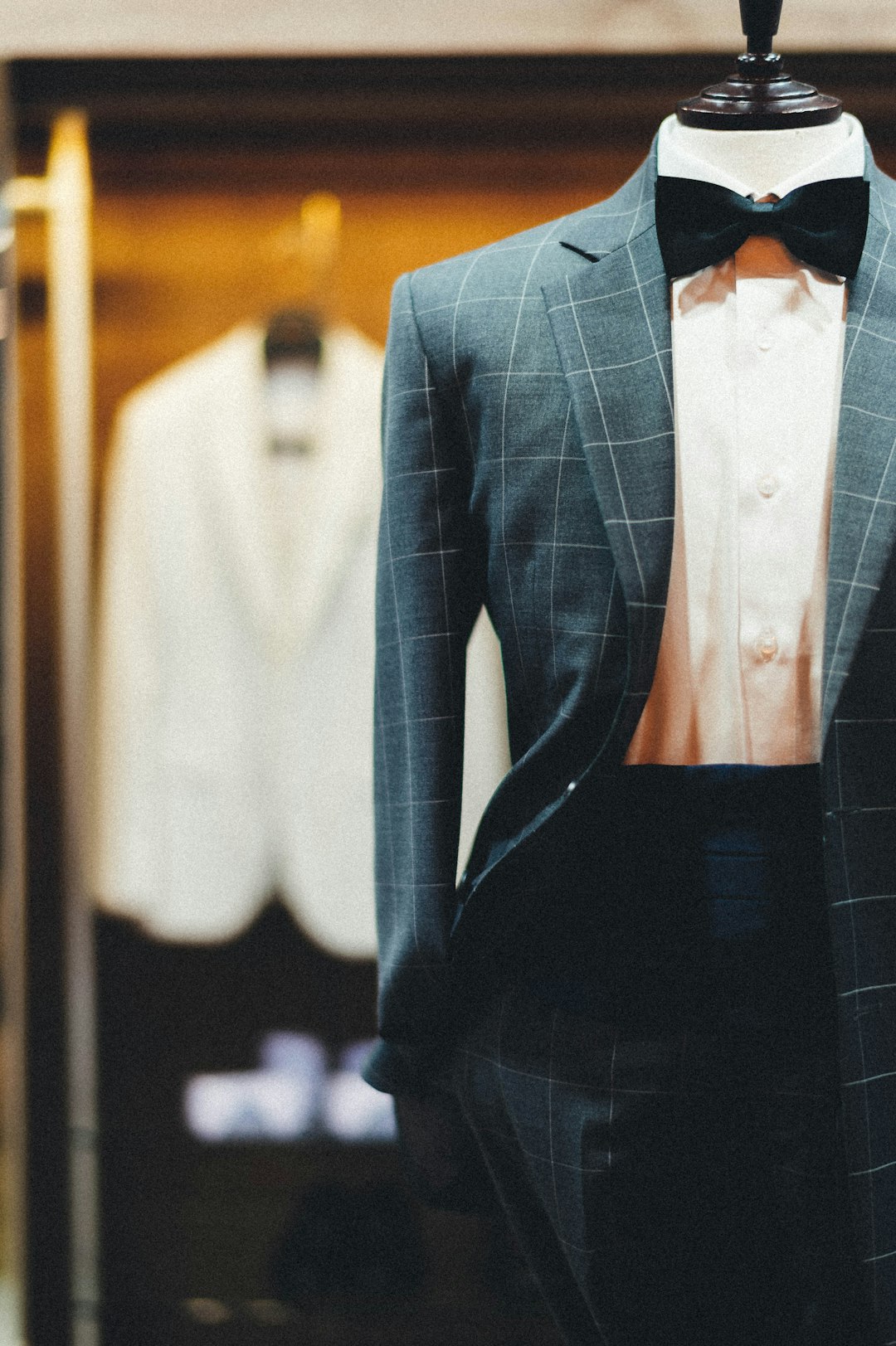 Groom in a black tuxedo jacket