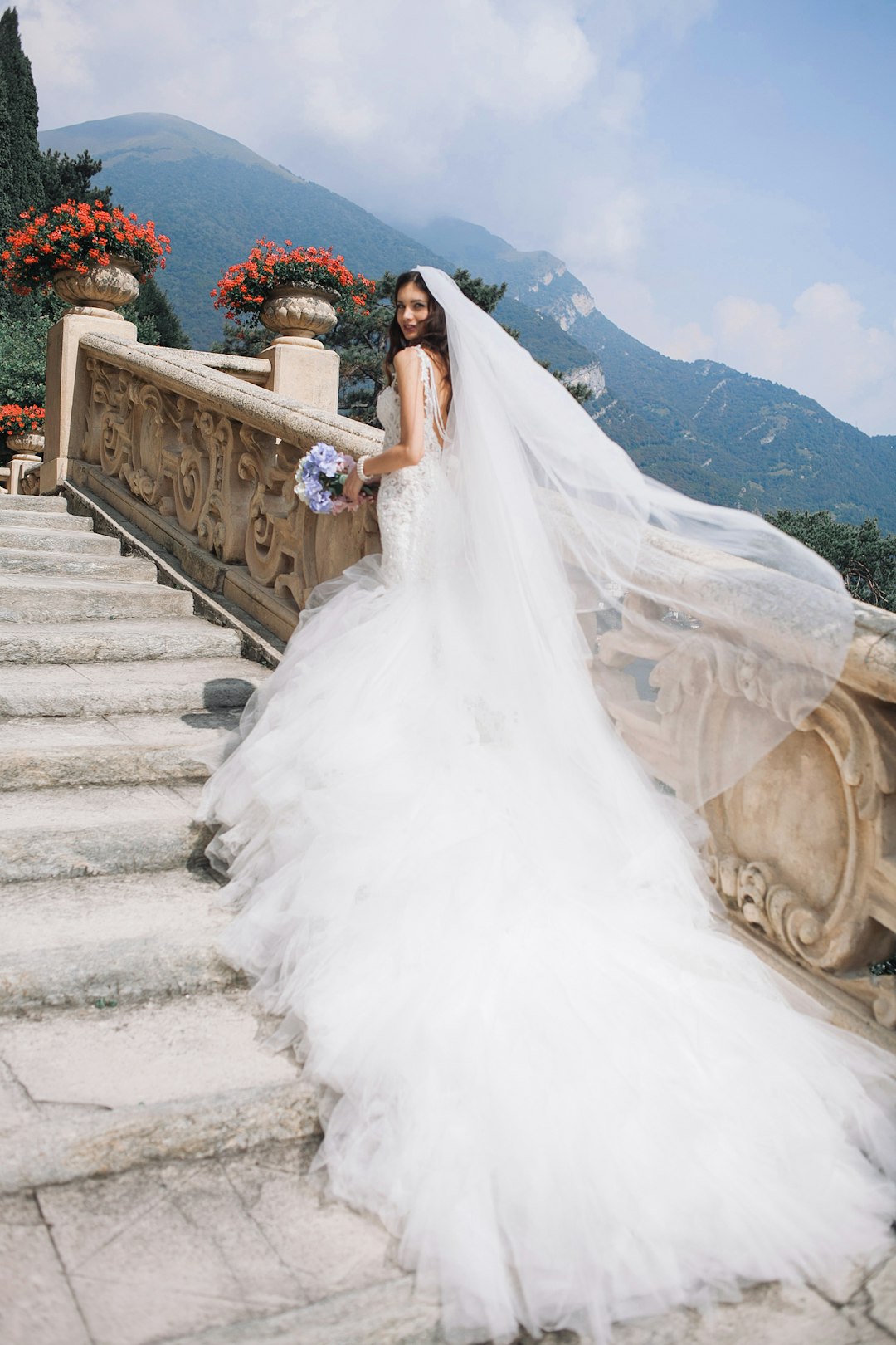 Vale & Ivory bride on white stairs