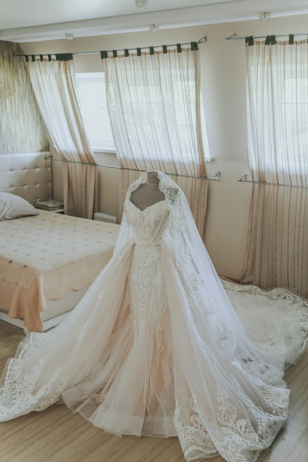 White wedding gown laid out for preservation