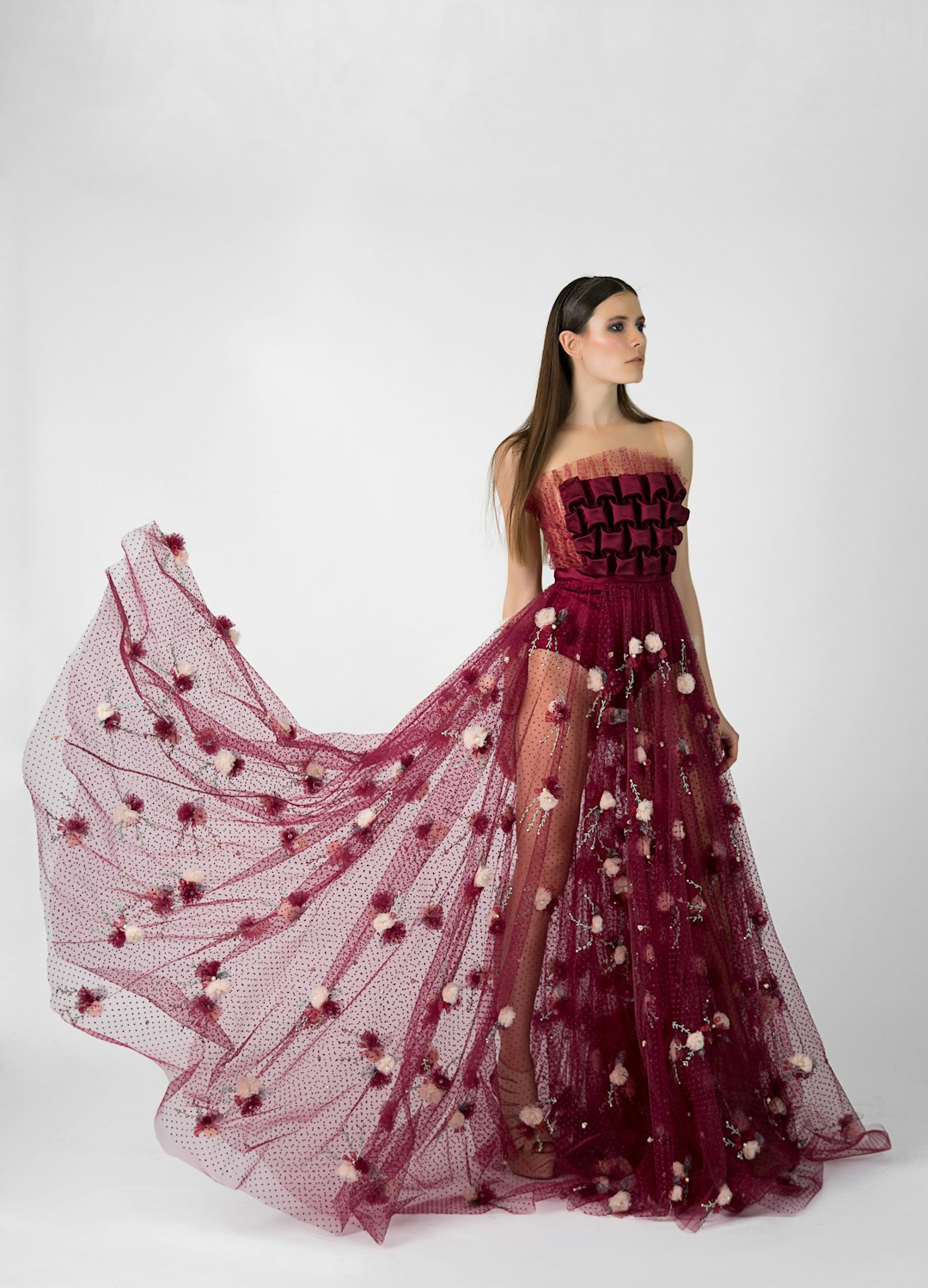Woman in a maroon formal dress